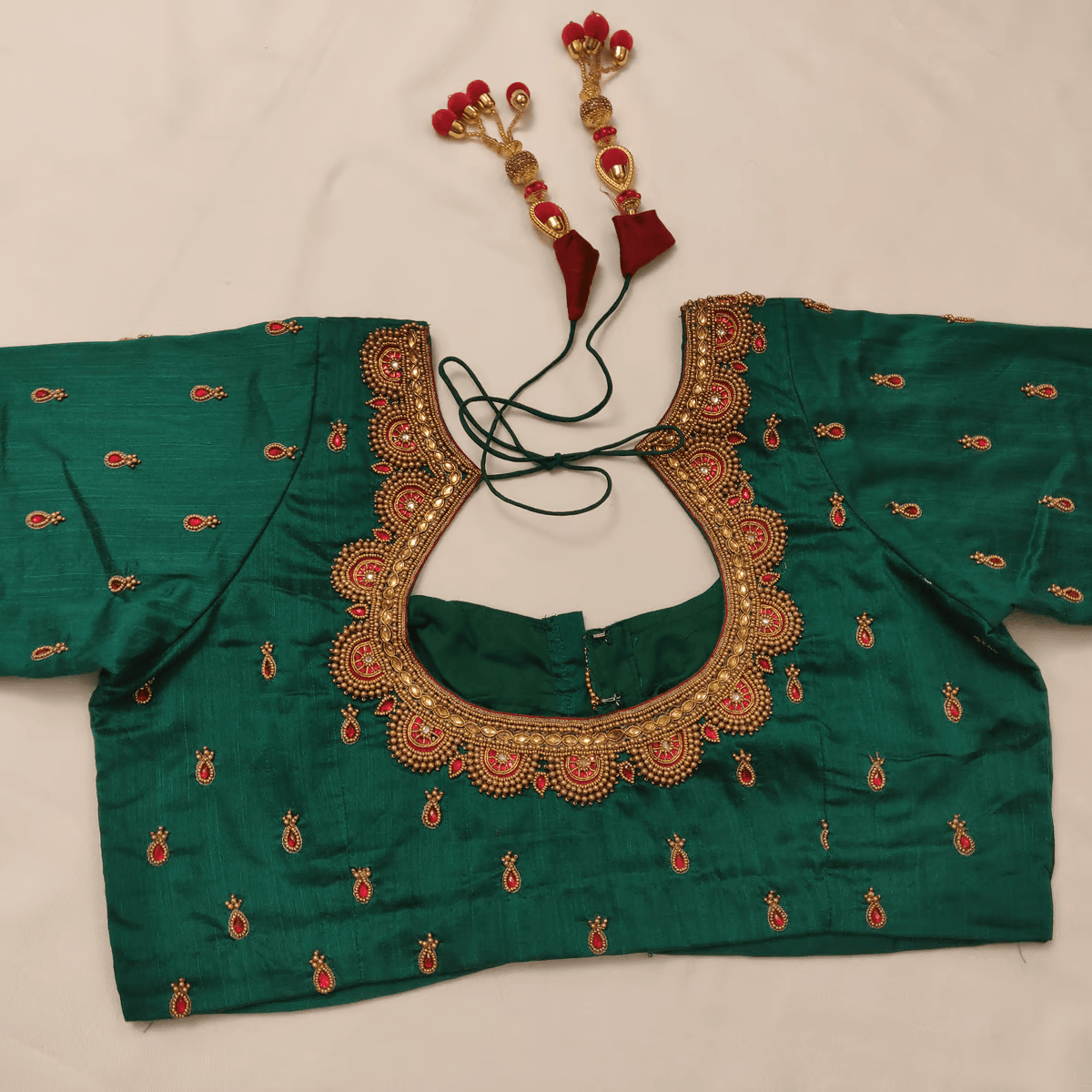 store_01GT9YVKDCY4Q2GP2Q2XY9CW6K_2Fassets_2F1677718913017-Women_s_2520Blouse_2520with_2520golden_2520thread_2520work_2520with_2520beads_2520on_2520green_2520silk